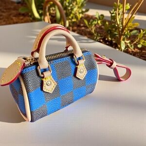 NWOT LV Blue and Black Mini Bag Charm